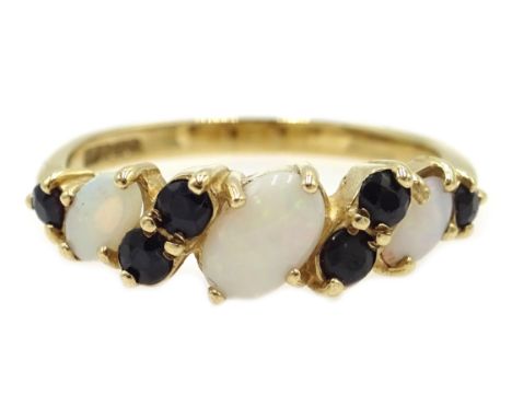 9ct gold opal and sapphire ring, hallmarked Condition Report &amp; Further Details Approx 2.1gm, size P