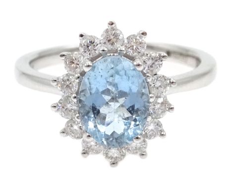 18ct white gold aquamarine and diamond cluster ring, hallmarked