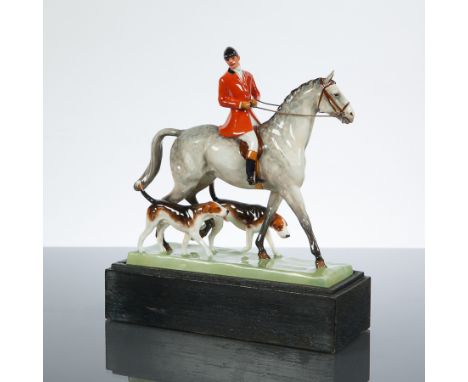 ROYAL WORCESTER FIGURE OF A HUNTSMAN WITH HOUNDS
by Doris Lindner, on a plinth, damaged, 20cm high 

