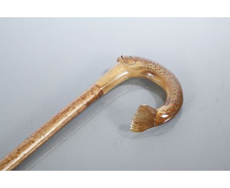 DRESSED STICK
the ram's horn handle carved as a brown trout, 115cm high