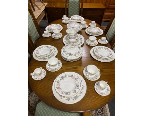A collection of Royal Worcester June Garland tea and dinner china  CONDITION REPORT: One tureen has a crack to one of the han