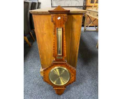 An early 20th century mahogany barometer with brass dial and presentation plaque