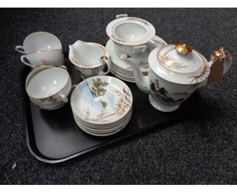 A tray containing Japanese eggshell tea service 