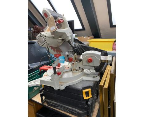 A Performance 210 MM slide compound mitre saw together with a Pro tool chest containing socket sets etc 