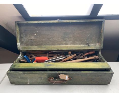 A joiner's tool box containing hand tools 