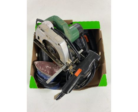A box of assorted power tools, Hitachi circular saw, Black and Decker sander, jigsaw etc 