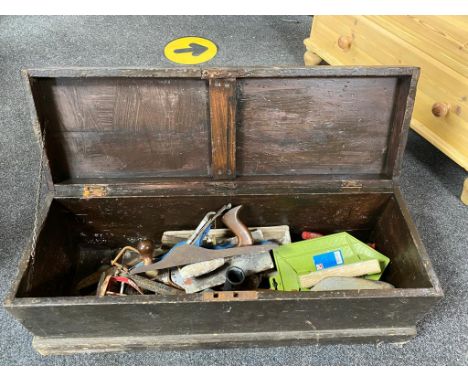 An antique pine tool box containing joiner's tools 