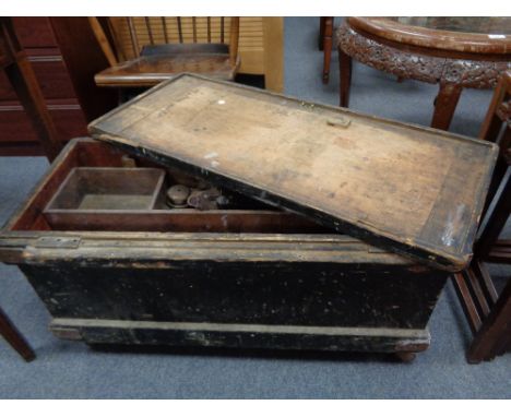 An antique pine joiner's tool box containing hand tools 