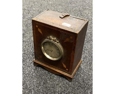 An antique inlaid mahogany mantel clock by Harvey of Newark 