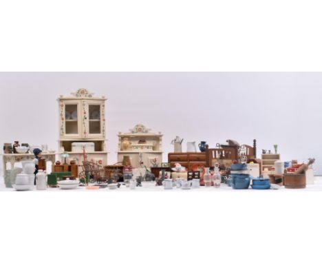 A collection of generally mid 20th century miniature doll's house kitchenware, furnishings &amp; furniture. The lot to includ