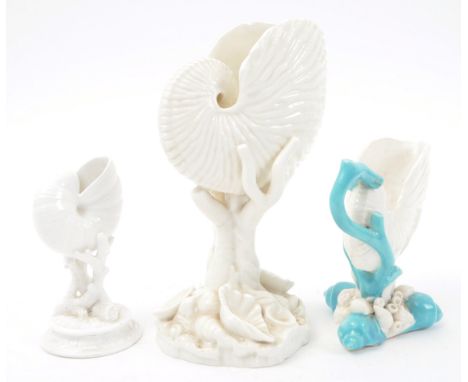 Three high Victorian late nineteenth century naturalistic white figured ceramic shell pieces, each mounted atop coral foot. T