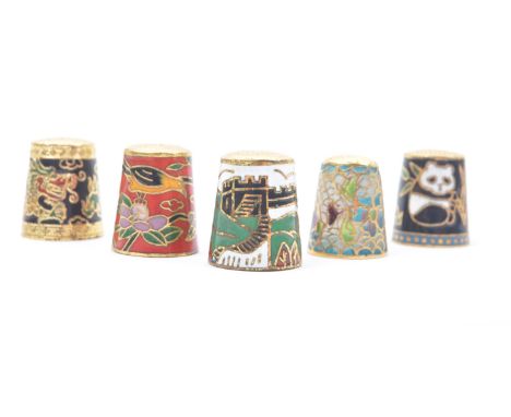 A collection of five 20th century Oriental / Chinese cloisonné souvenir thimbles. One on white ground depicting the Great Wal