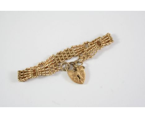 A 9CT GOLD FANCY GATE LINK BRACELET with padlock clasp, 16cm long, 18.8 grams
