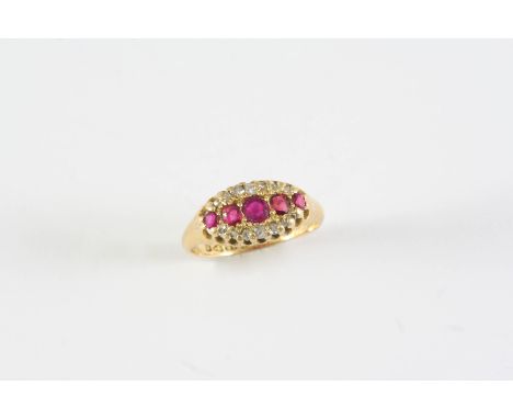 A RUBY AND DIAMOND CLUSTER RING the five graduated circular-cut rubies are set within a surround of rose-cut and single-cut d