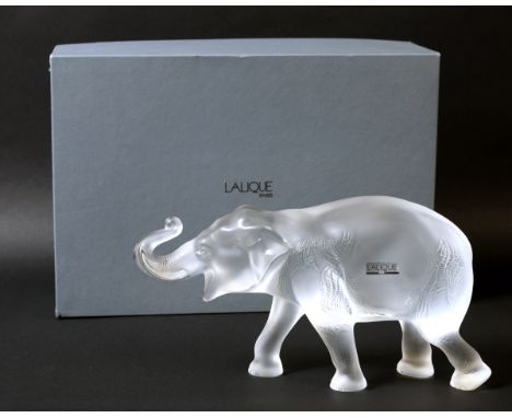 LALIQUE - LARGE SUMATRA ELEPHANT a large crystal glass sculpture of a Sumatra Elephant, with trunk up. In a fitted Lalique bo