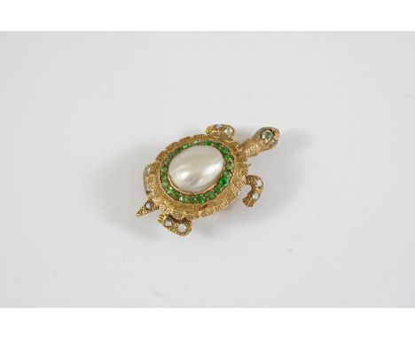 A GOLD, DIAMOND, PEARL AND DEMANTOID GARNET TURTLE BROOCH the body formed with a blister pearl, within a surround of demantoi