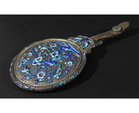 CHINESE WHITE METAL, ENAMELLED AND JADE MOUNTED MIRROR, the circular plate on a back with birds in a flowering prunus tree ab