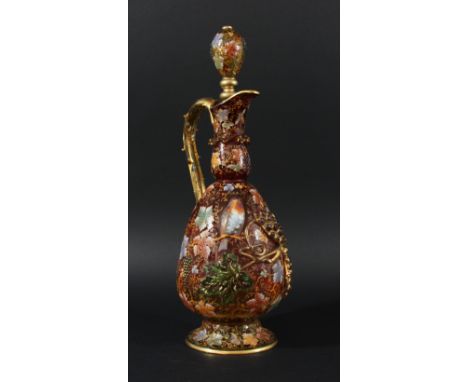 MOSER AMBERINA GLASS EWER OR PITCHER AND STOPPER, late 19th century, the ovoid body graduating from red to yellow, applied wi