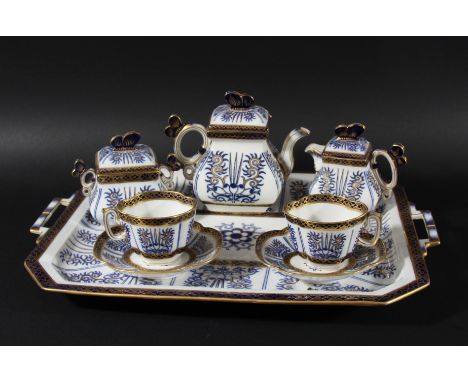 COALPORT AESTHETIC TASTE TEASET AND TRAY, later 19th century, with blue and gilt Royal Lily style decoration and butterfly ha