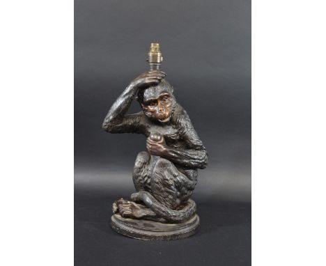 LARGE POTTERY TABLE LAMP - LAMP a large table lamp in the form of a Monkey, with a oval plinth and brass light fitting. Impre