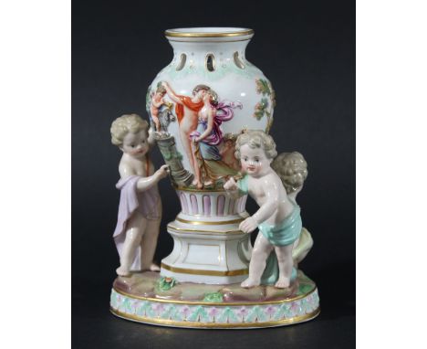 MEISSEN GROUP, 20th century, modelled as three children around a large vase, blue crossed sword marks, incised 1649, height 1