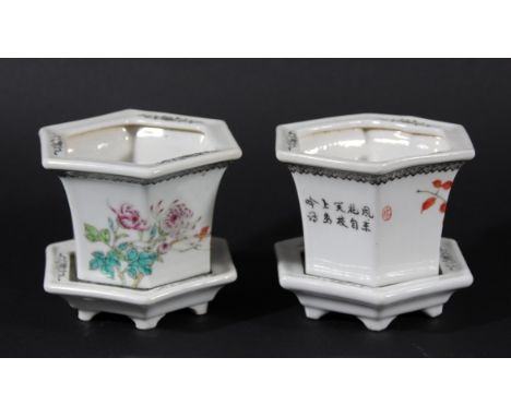 PAIR OF CHINESE HEXAGONAL JARDINIERES AND STANDS, 20th century, enamelled with birds in flowers, iron red seals and an inscri