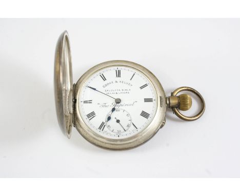 A SILVER HALF HUNTING CASED POCKET WATCH the white enamel dial signed Cooke &amp; Kelvey, Calcutta, Simla, Delhi &amp; Lahore