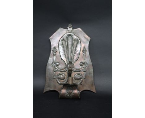 ARTS &amp; CRAFTS COPPER WALL SCONCE with a sinuous design to the back, and with a single candle holder supported on a curved