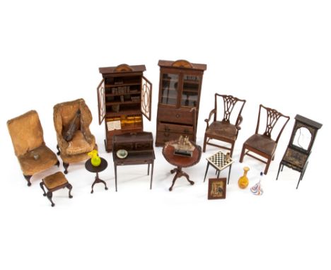 A collection of Edwardian dolls house furniture and furnishings, including Chippendale style chairs with leather seats, Japan