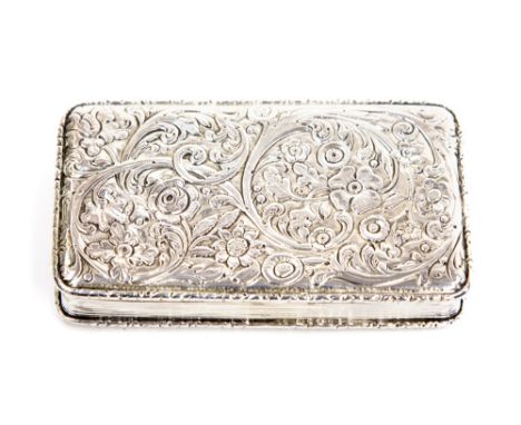 A George IV silver snuff box, rectangular form with repousse foliate scroll design to the top, the reverse engine turned, bor
