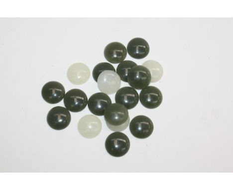 A collection of 19 green and white jade cabouchon buttons, 1cm diameter