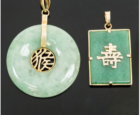 A circular Jade pendant, set with 14k gold; and another square pendant (2)