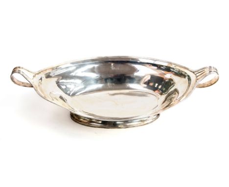A George III silver basin, Neoclassical ogee boat form with applied fluted border and strap handles, on a pedestal foot, Henr