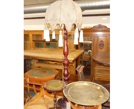 Occasional furniture to include; a turned standard lamp, brass topped Benares table, yew wood drum table, and a wine table (4