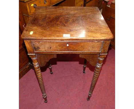 An early 19th century mahogany round cornered single drawer work table, raised on bobbin turned supports to castors, width 43