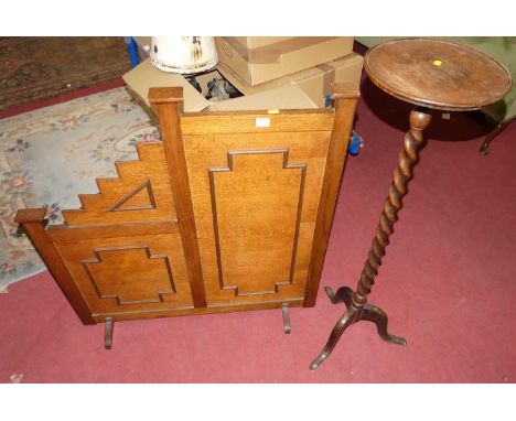A 1930s panelled oak firescreen with stepped profile, width 87cm, together with an early 20th century spiral turned oak plant