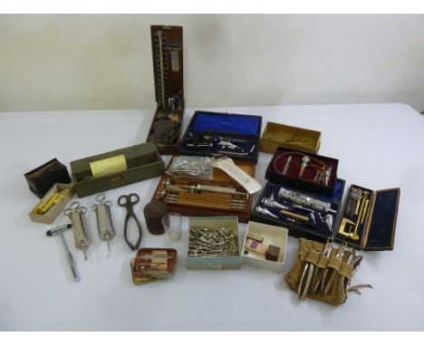 A quantity of antique and vintage medical instruments, some in original cases