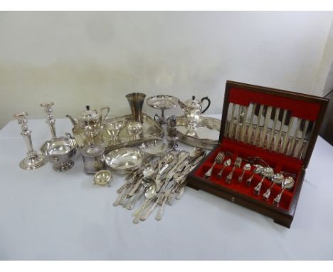 A quantity of silver plate to include trays, teasets, dishes and a canteen of flatware in fitted case