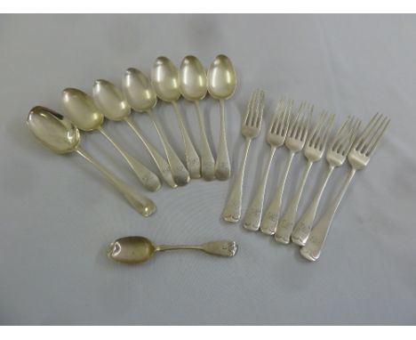 A set of six silver Old English pattern dessert spoons, Sheffield 1904, five silver dessert forks a silver table fork, a teas