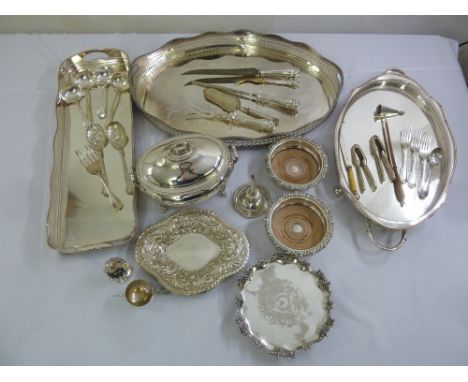 A quantity of silver plate to include trays, coasters, vegetable dish and cover, condiments and flatware