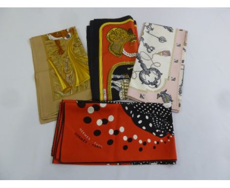 Four Hermes of Paris silk scarves of various patterns and colours