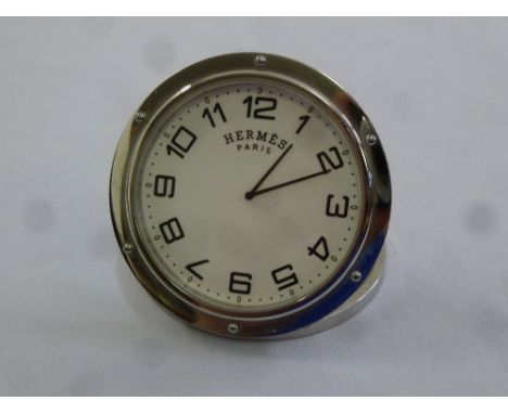 A Hermes travel/desk clock of circular form