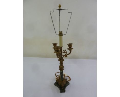 A gilt metal and marble lamp base in the form of a three branch candelabrum