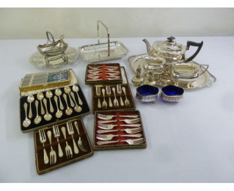 A quantity of silver plate to include trays, a tea set, condiments and flatware