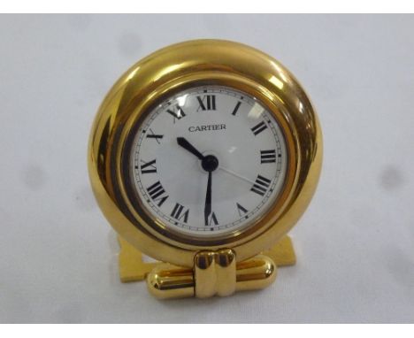 A Vintage Cartier travel/desk clock of circular form