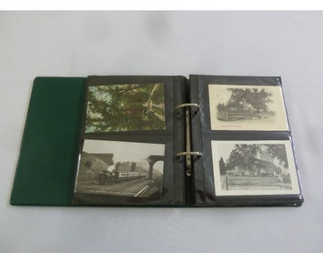 An album of local sepia and coloured vintage postcards, approx 76 cards