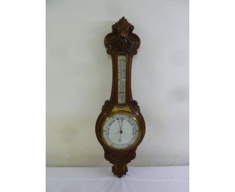 An oak cased banjo barometer with mercury thermometer  A/F