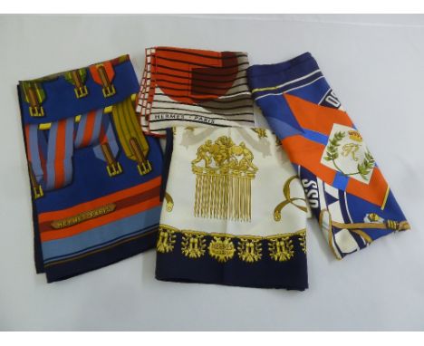 Four Hermes of Paris silk scarves of various patterns and colours