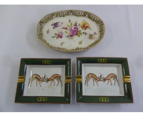 A pair of French Hermes style ashtrays and a circular hand painted tray