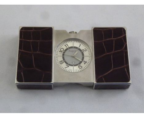 An Asprey travel clock in faux crocodile case
